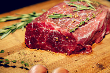 Raw beef on a cutting board.