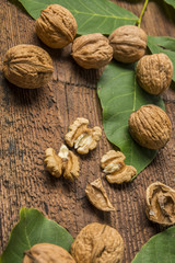 fresh walnuts on an old wooden table