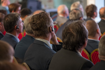 Audience at the conference, back view