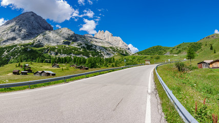 Naklejka premium Empty road to Marmolada mountain, Dolomiti Italy.
