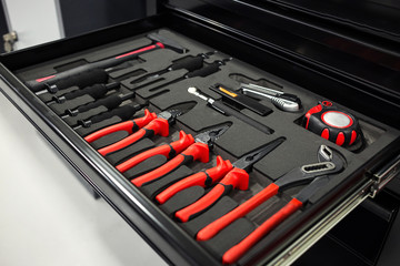 tools For repair and diagnostics of cars in the garage Car,set of tools,Tools and wrenchбwrench and tools close-up in box,replace automotive spare parts,auto parts,tool service,Toolbox with tools