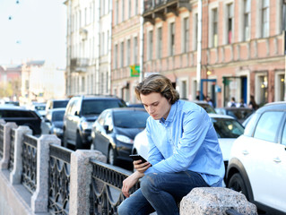 Teenage boy using smart phone