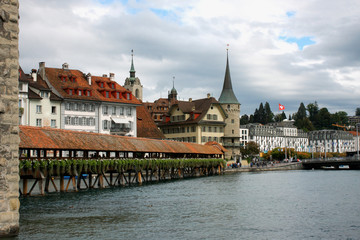 Famous Chapel bridge in Lucerne in a beautiful summer day, Switzerland