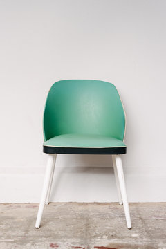 retro green chair after it's been restored with a good clean and paint