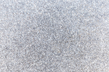 Close-up of natural granite stone abstract texture background.