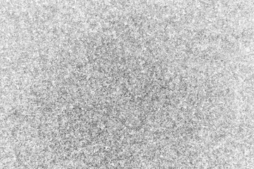 Close-up of natural granite stone abstract texture background in black and white.