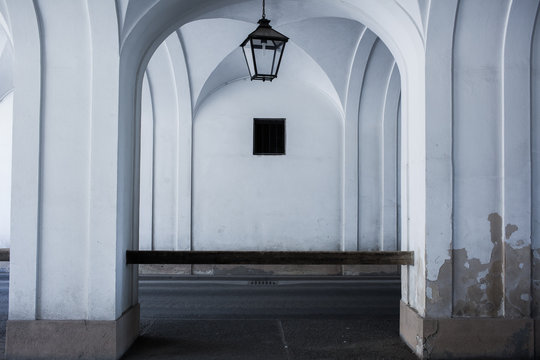 White round arches with vintage lamp