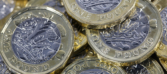 One Pound Coins in a panoramic format - British Currency