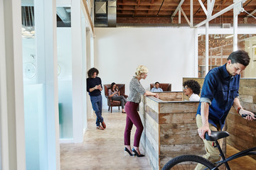 Friends hanging out at a high tech office