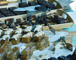 Slices of Cake Displayed on a Market Stall Table A, Shallow Depth of Field Split Toning Horizontal Photography