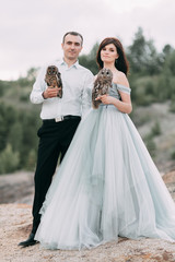 Fototapeta na wymiar mystical wedding with owls and unusual place