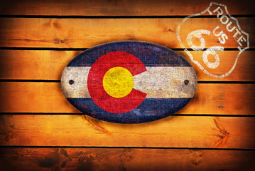 Colorado flag and shield of Route 66.
