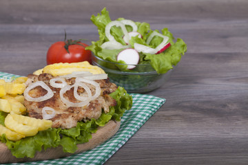 Preparing delicious homemade chicken burger