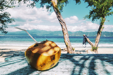 Fresh coconut drink by the beach