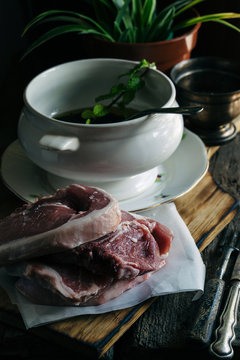 Preparing lamb chops.
