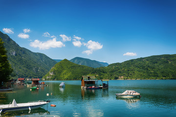 Fototapeta na wymiar Perucac, Serbia July 31, 2017: Houseboats of Perucac lake, Tara National Park (Serbia) 