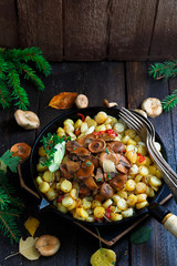 Red pine mushroom with potatoes. Saffron milk cap. Fried mushrooms.
