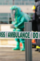 Paramedic wearing Gas Tight Suit (GTS) during a training exercise against biological, chemical or...