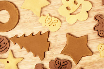 Christmas cookies on a wooden plate on a wooden background