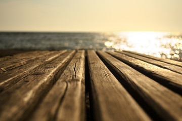 Bench by the sea in morning, blurred