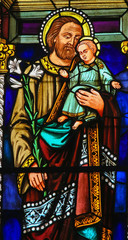 Naklejka premium Stained Glass - Joseph and the Child Jesus