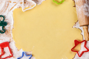 cutting out cookies from dough
