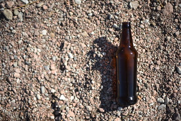 Brown Glass Bottle Floating in Water