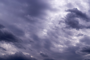 Naklejka na ściany i meble gray heavy rainy clouds at summer. background, weather.