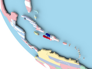 Haiti with flag on globe