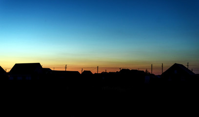 Rural Village in Silhouette at Dusk