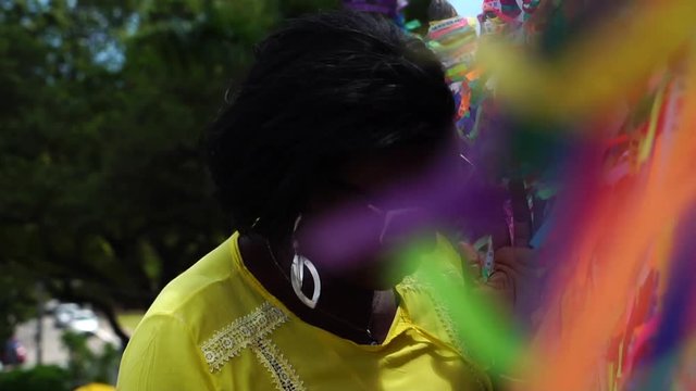 Brazilian Woman Praying and Making a Wish in Bonfim Church, Salvador, Bahia, Brazil