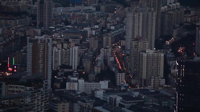 Shekou - Shenzhen; city panorama at evening; shot from Nan Shan hill; handheld footage; 