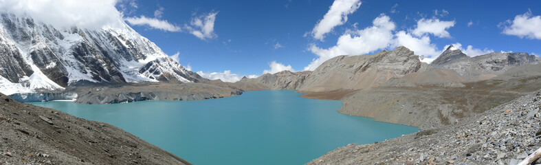 Panorama of the The Tilicho lake and Tilicho peak, beautiful snow capped Himalayas and the highest lake for its size in the world