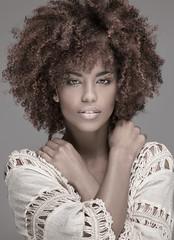 Beautiful woman with afro hairstyle posing.