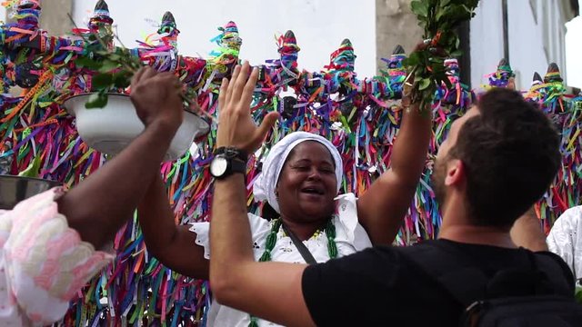 Candomble group blessing a tourist in Salvador, Bahia, Brazil