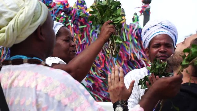 Candomble group blessing a tourist in Salvador, Bahia, Brazil