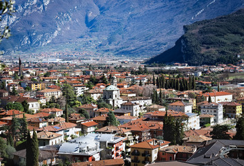 Fototapeta na wymiar Riva del Garda, Italy - Mart 10, 2017: Beautiful panoramic view on Riva del Garda, Alto Adige Province
