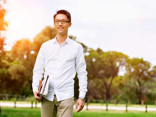 Young businessman during his break in park