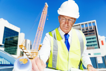 Engineer builder at construction site