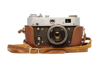 Analog soviet camera FED in the leather case isolated on white background. Old dusty retro film...