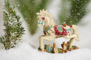 Horse in the falling snow