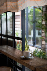 A cup of coffee at the cafe interior.