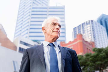 Fototapeta premium Portrait of confident businessman outdoors