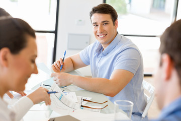 Fototapeta premium Young man in casual in office