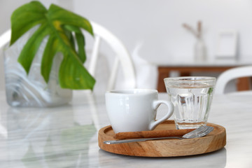 Hot coffee in white coffee shop.