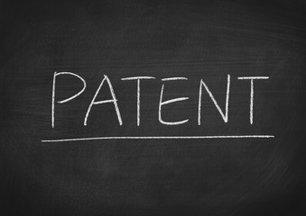 Obraz premium patent concept word on a blackboard background