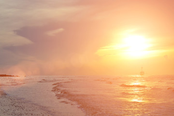 Fototapeta premium The sun began to rise from the sea in the morning.