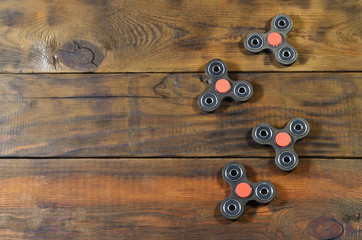 Popular finger spinner device. Modern fidget spinning toy on bearings. Spin it in hands & learn...