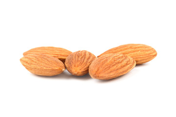 Closeup of almonds, isolated on the white background.
