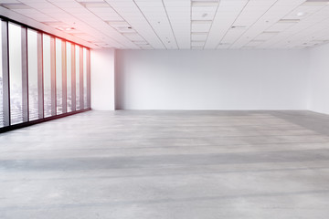interior empty office room with white wallpaper without furniture in a new building.big space